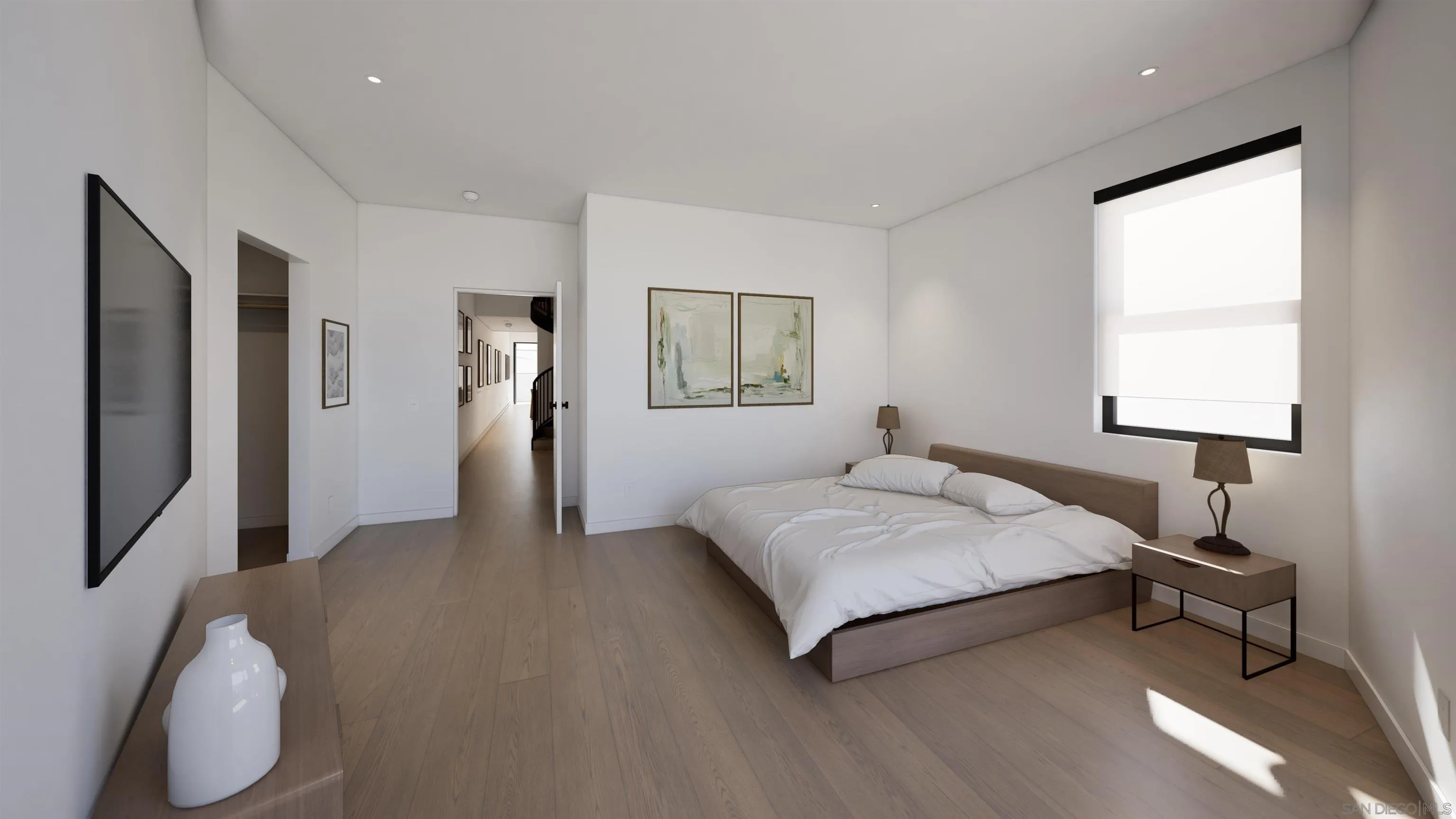 Modern bedroom with a low wooden bed, white bedding, light wood floors, and a large shaded window.