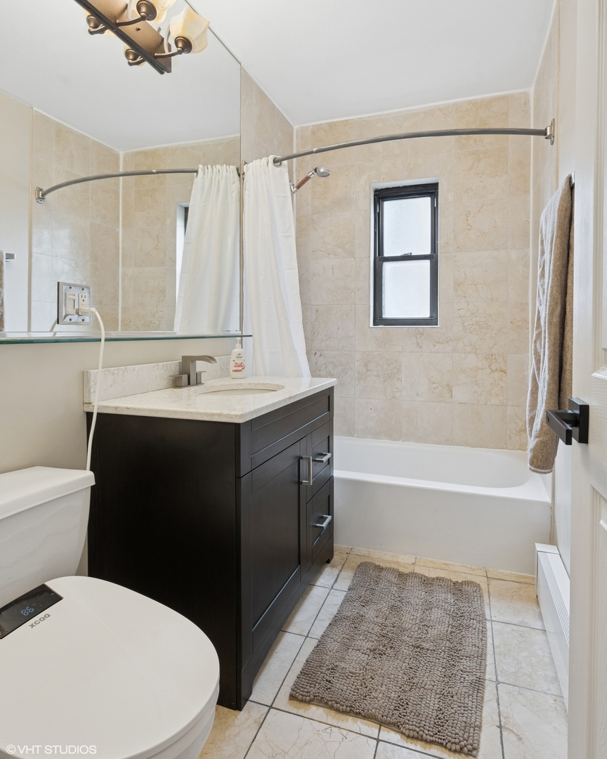 6060 N RIDGE Avenue Unit: 4E