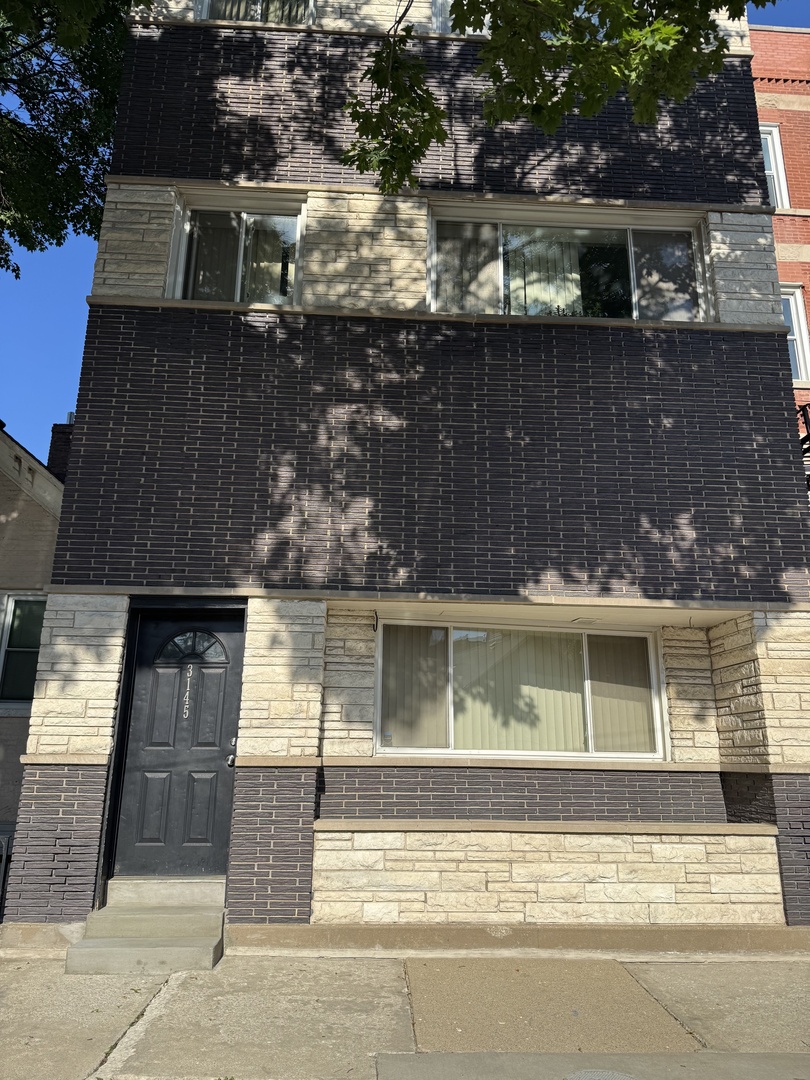 3145 S May Street Unit: 2F