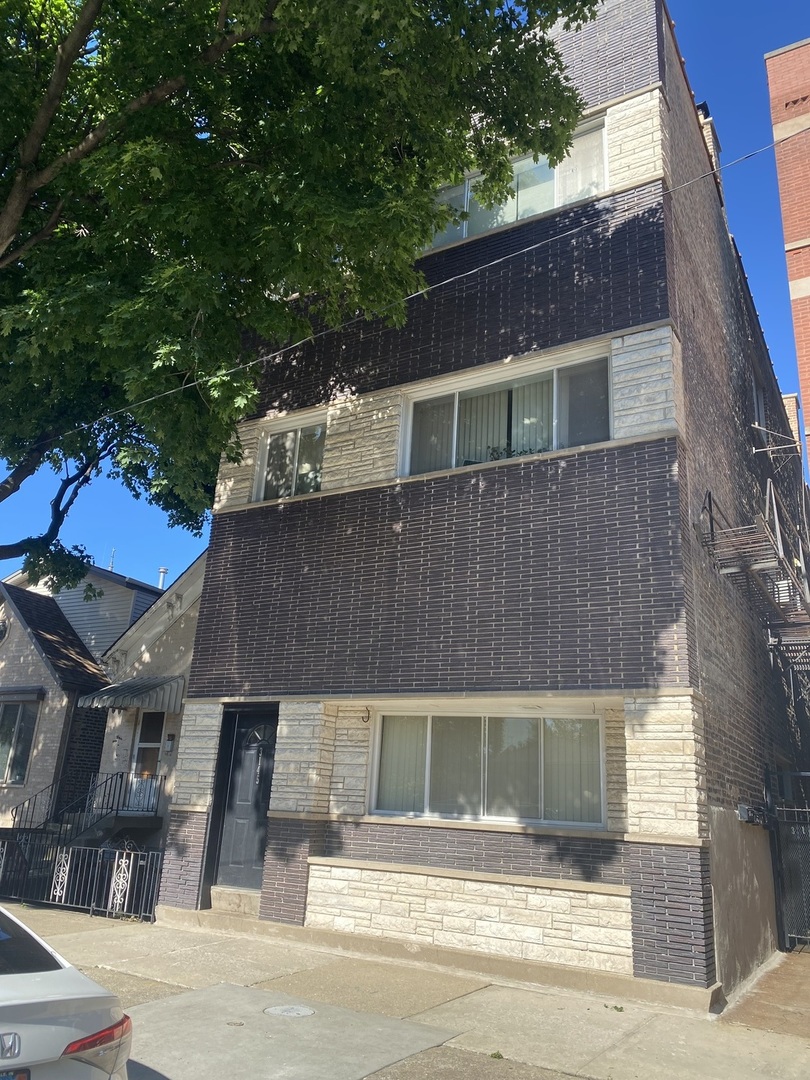 3145 S May Street Unit: 1F