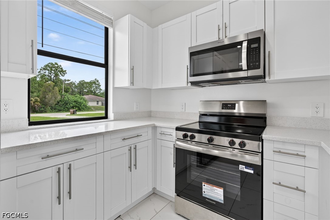 909/911 Homestead RD S