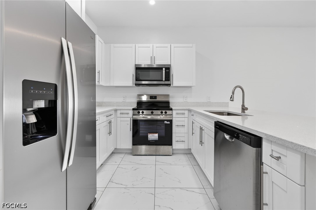909/911 Homestead RD S