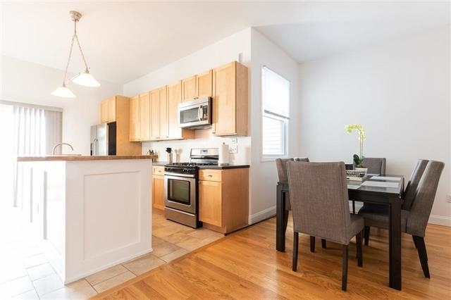 128 OGDEN AVE Unit: 1