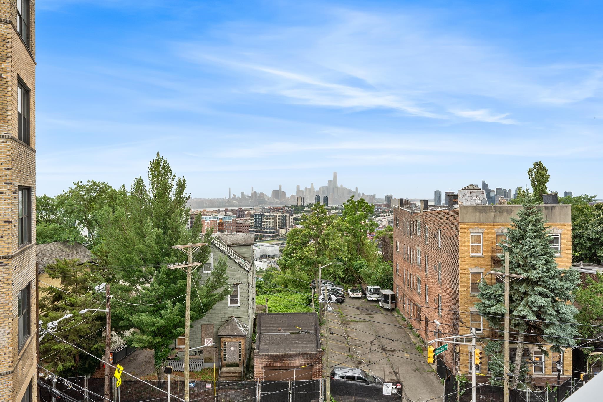 1601 MANHATTAN AVE Unit: 203