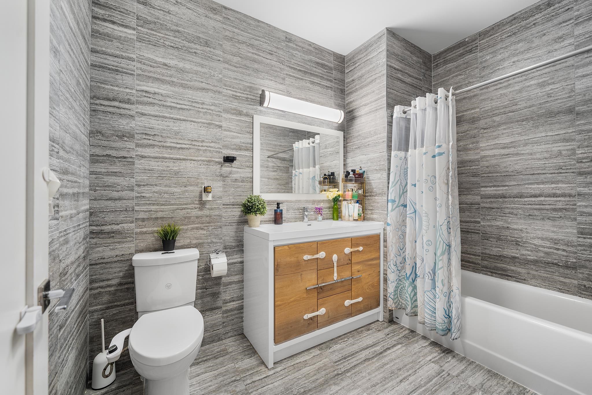 1601 MANHATTAN AVE Unit: 203