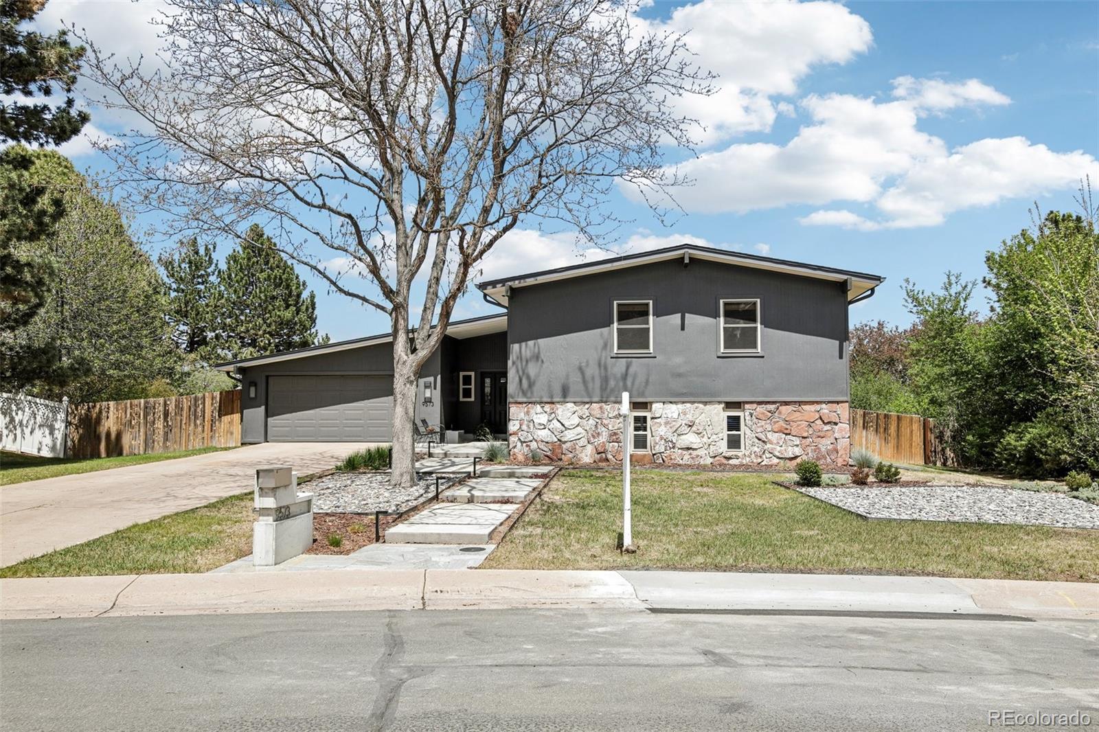 9573 E Grand Place