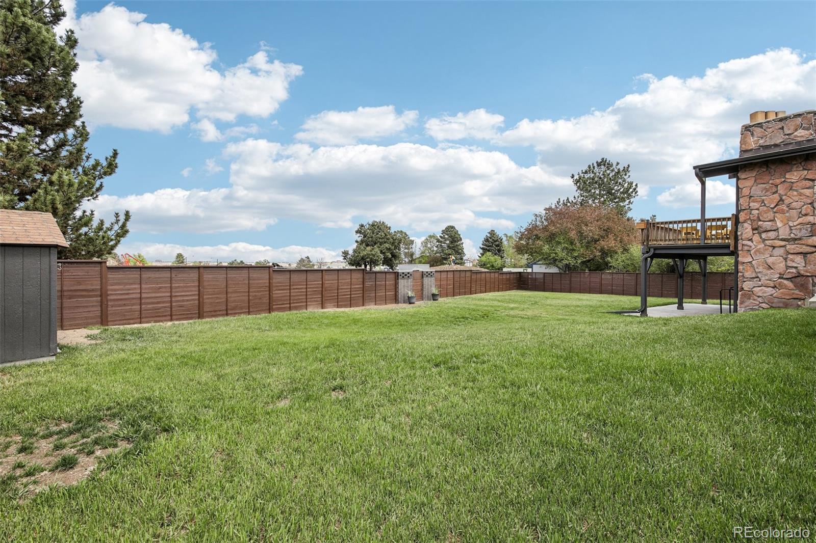 9573 E Grand Place