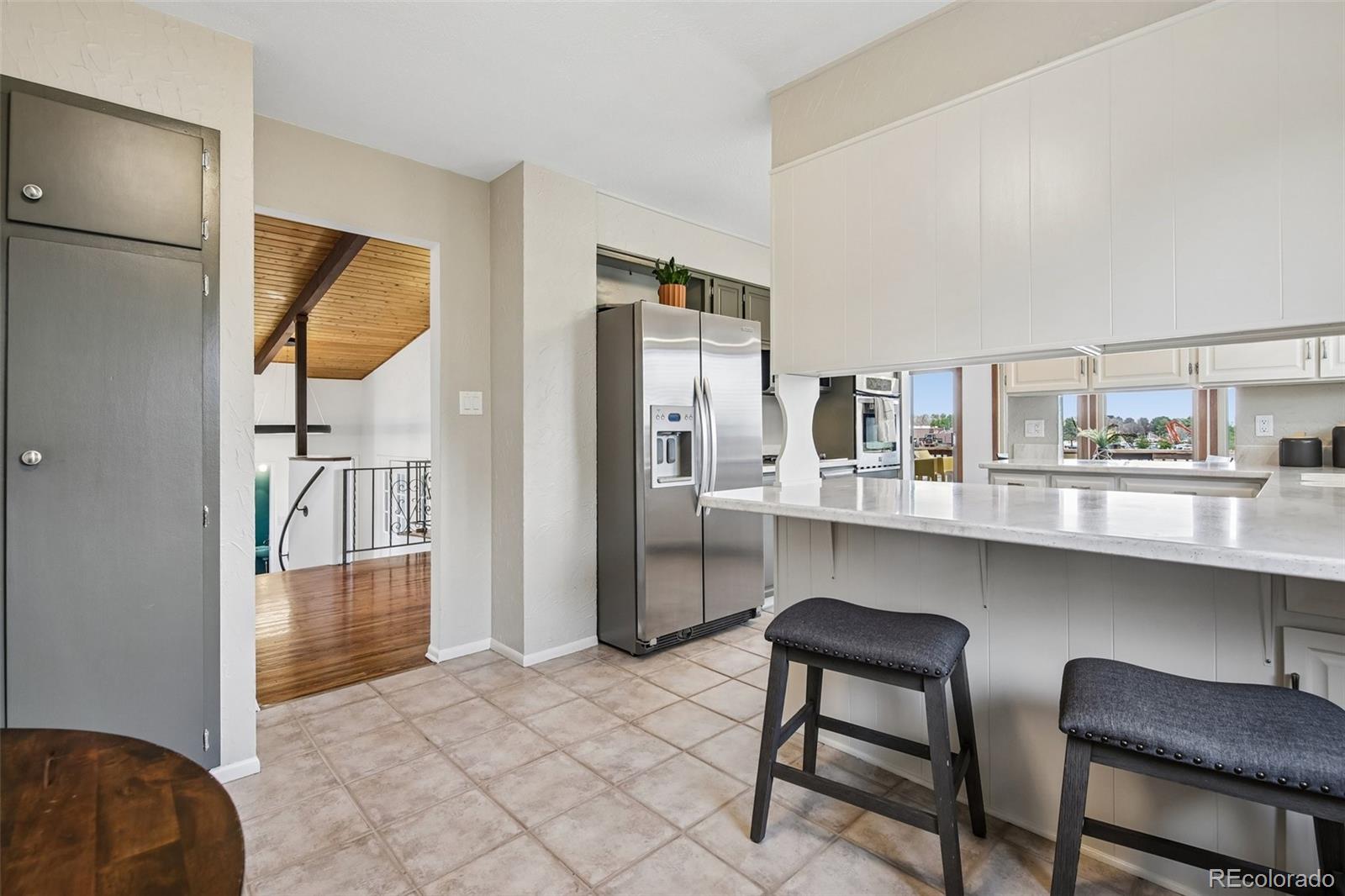 9573 E Grand Place