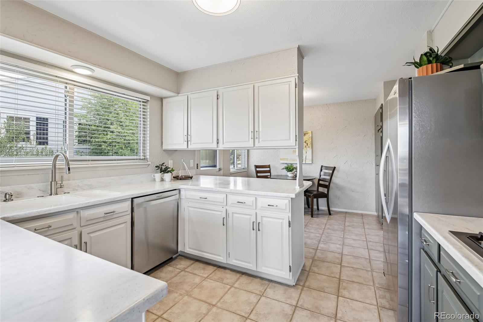 9573 E Grand Place