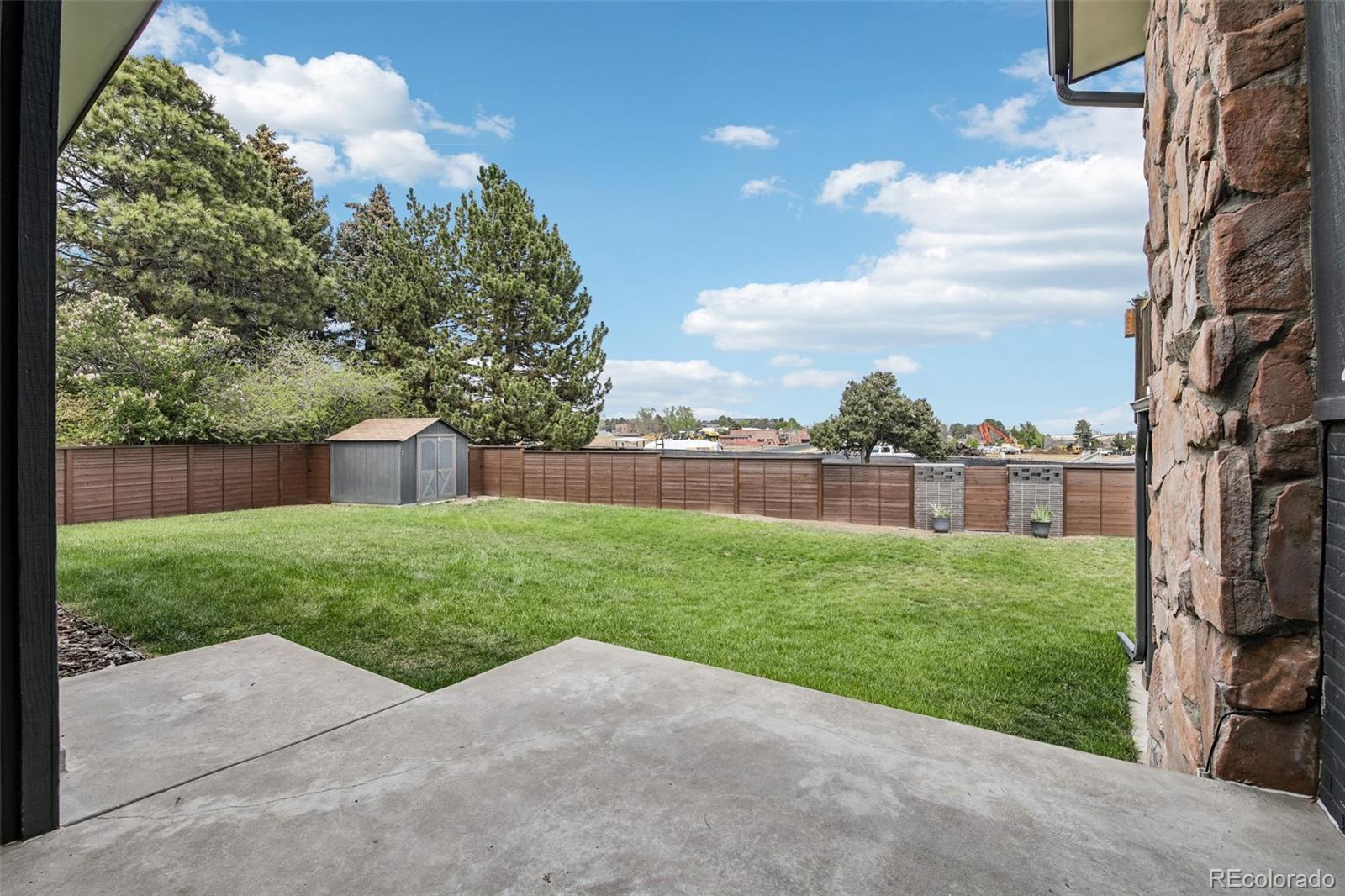 9573 E Grand Place