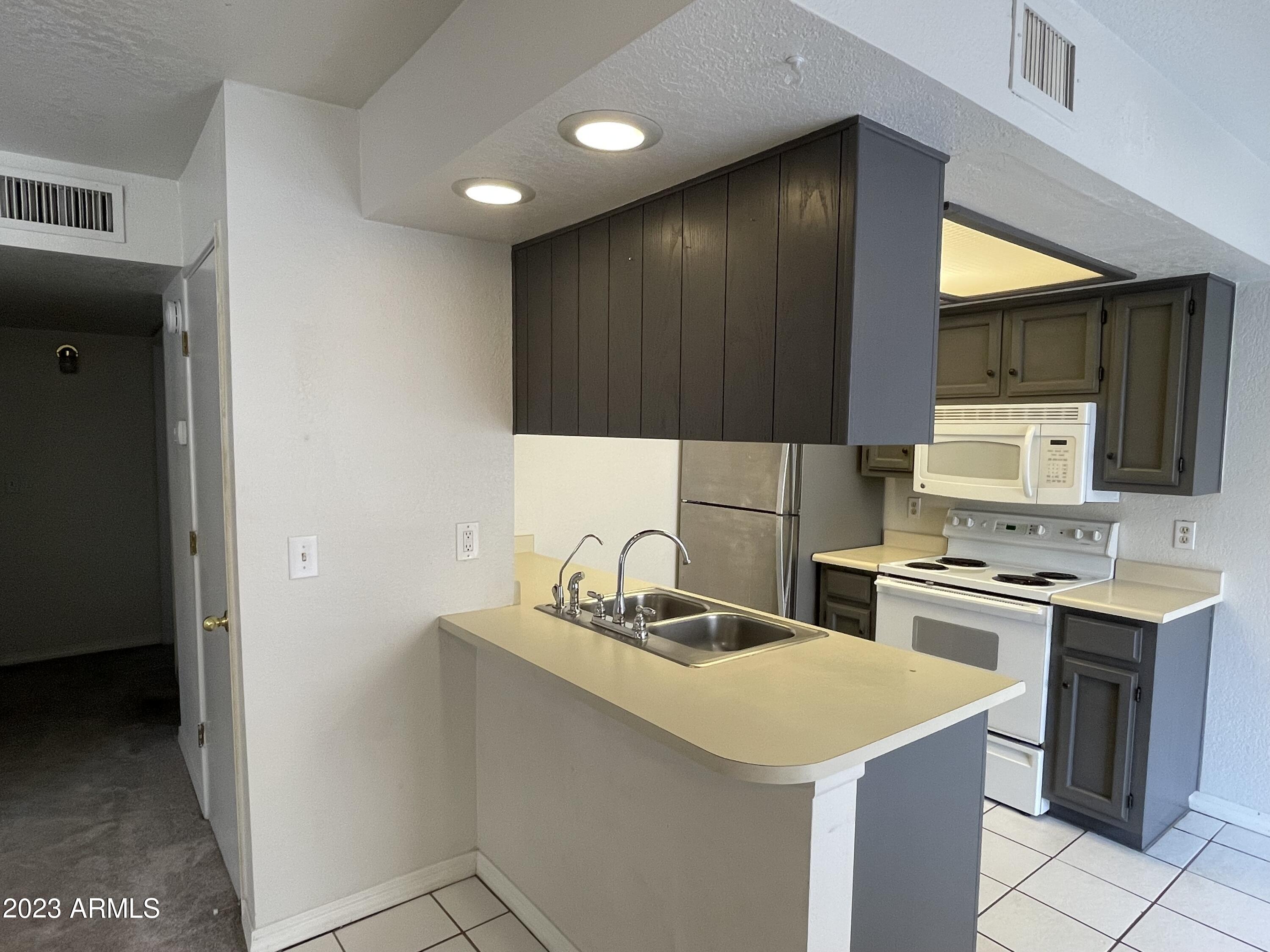520 N STAPLEY Drive, 116