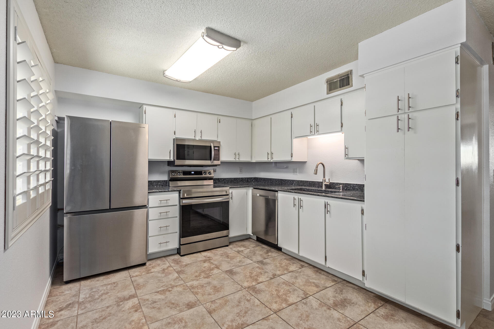 2452 E University Drive, 8