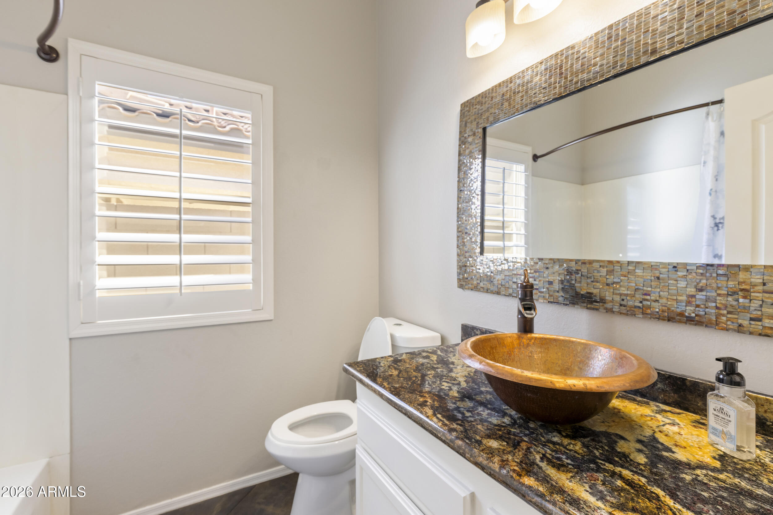 6943 W LAREDO Street