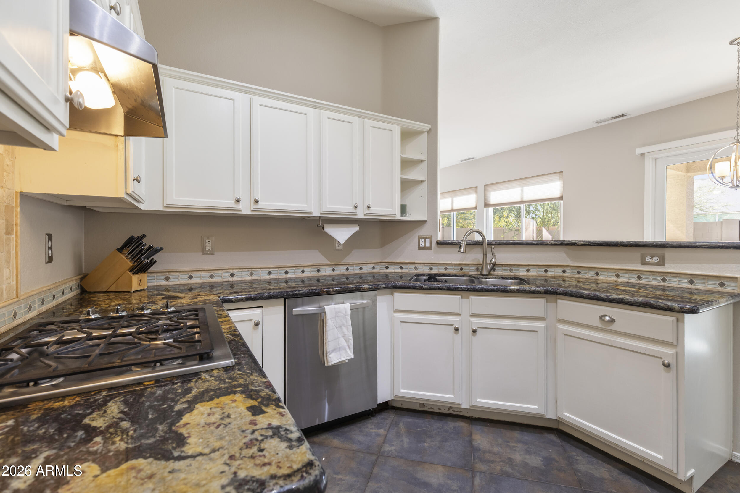 6943 W LAREDO Street