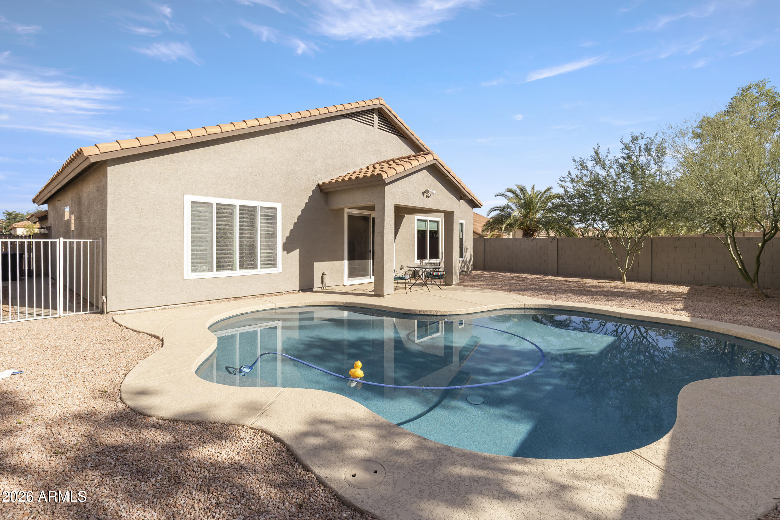 6943 W LAREDO Street