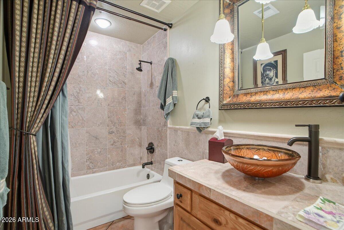 9032 N BROKEN BOW Street