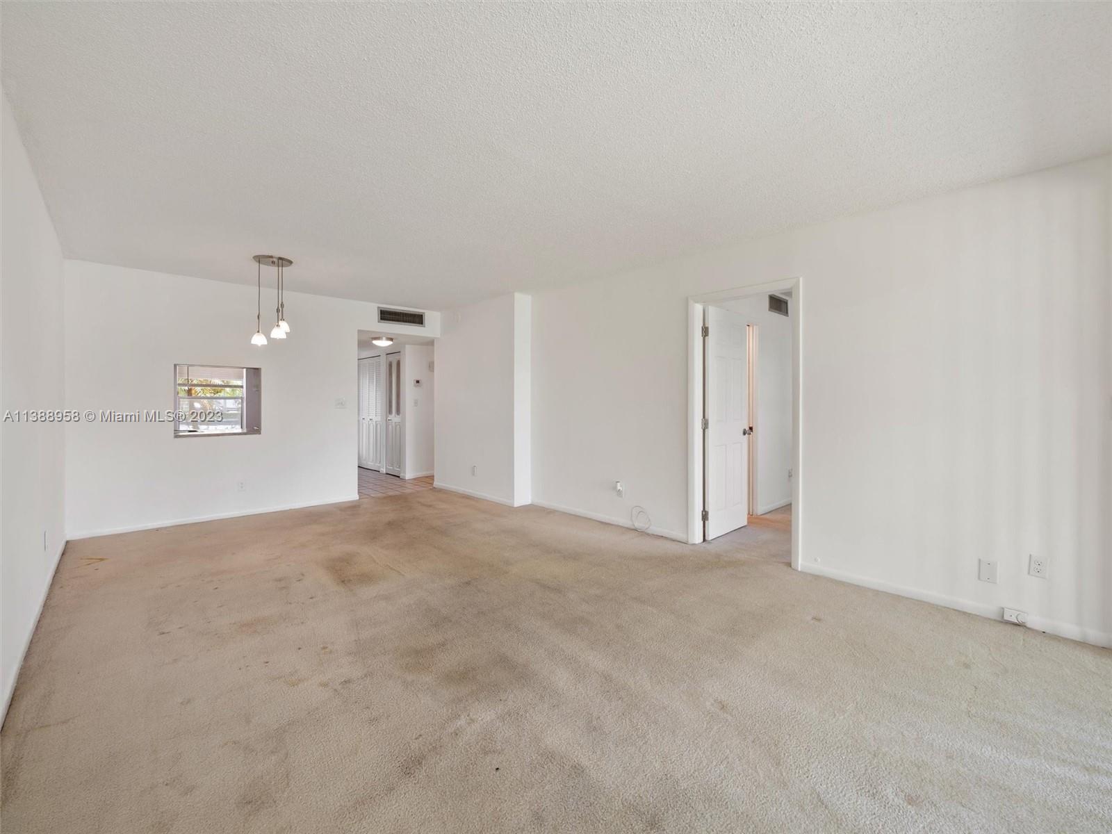 5980 NW 64th Ave Unit: 104