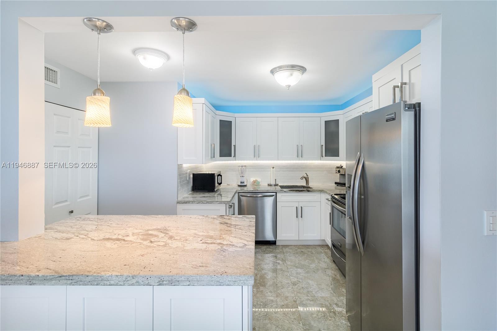 6061 Collins Ave # 6F