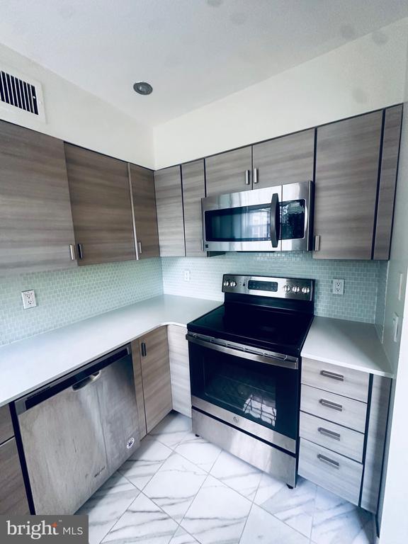 3831 NEWARK STREET NW Unit: F450
