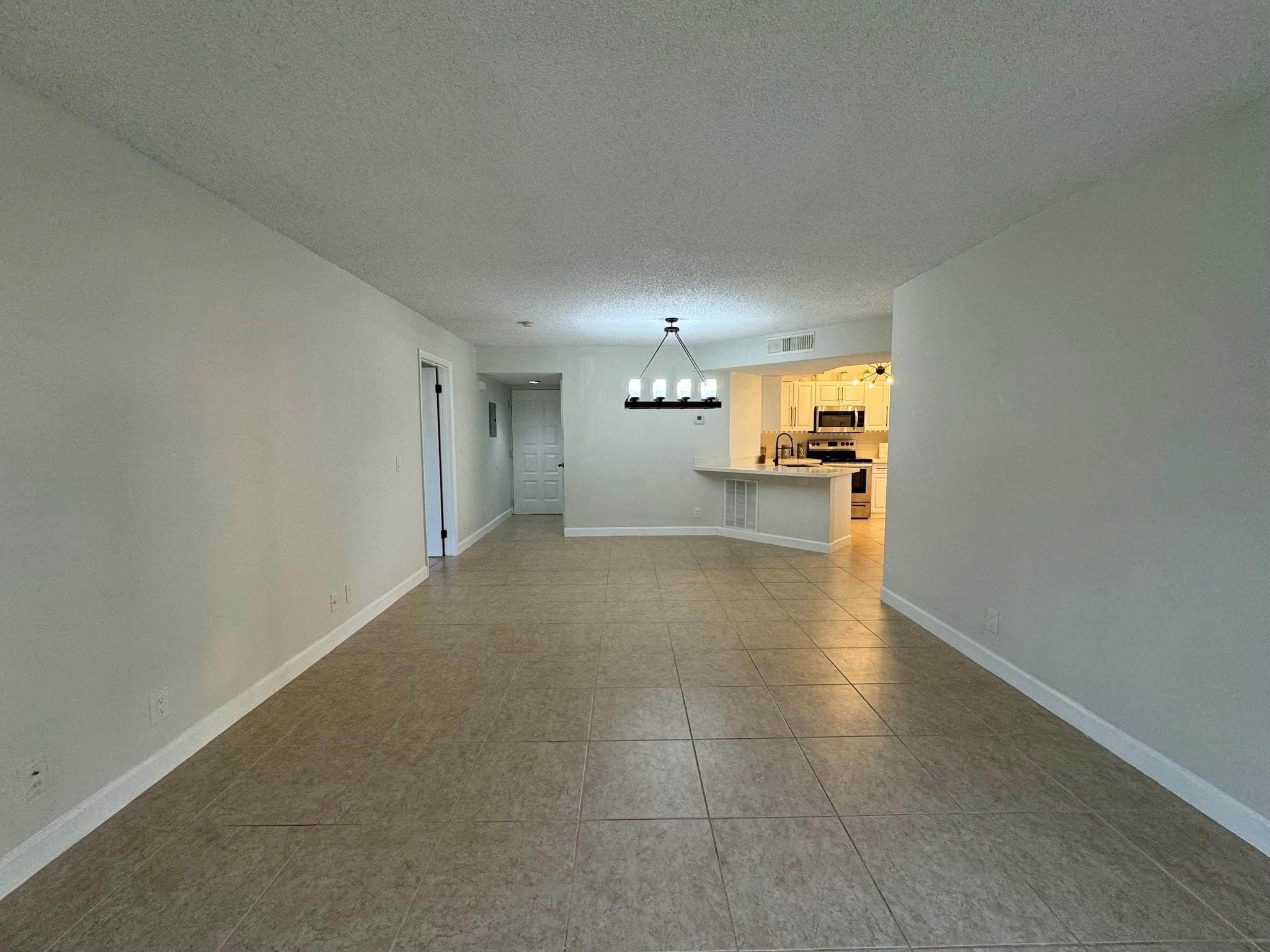 8901 Wiles Rd 208