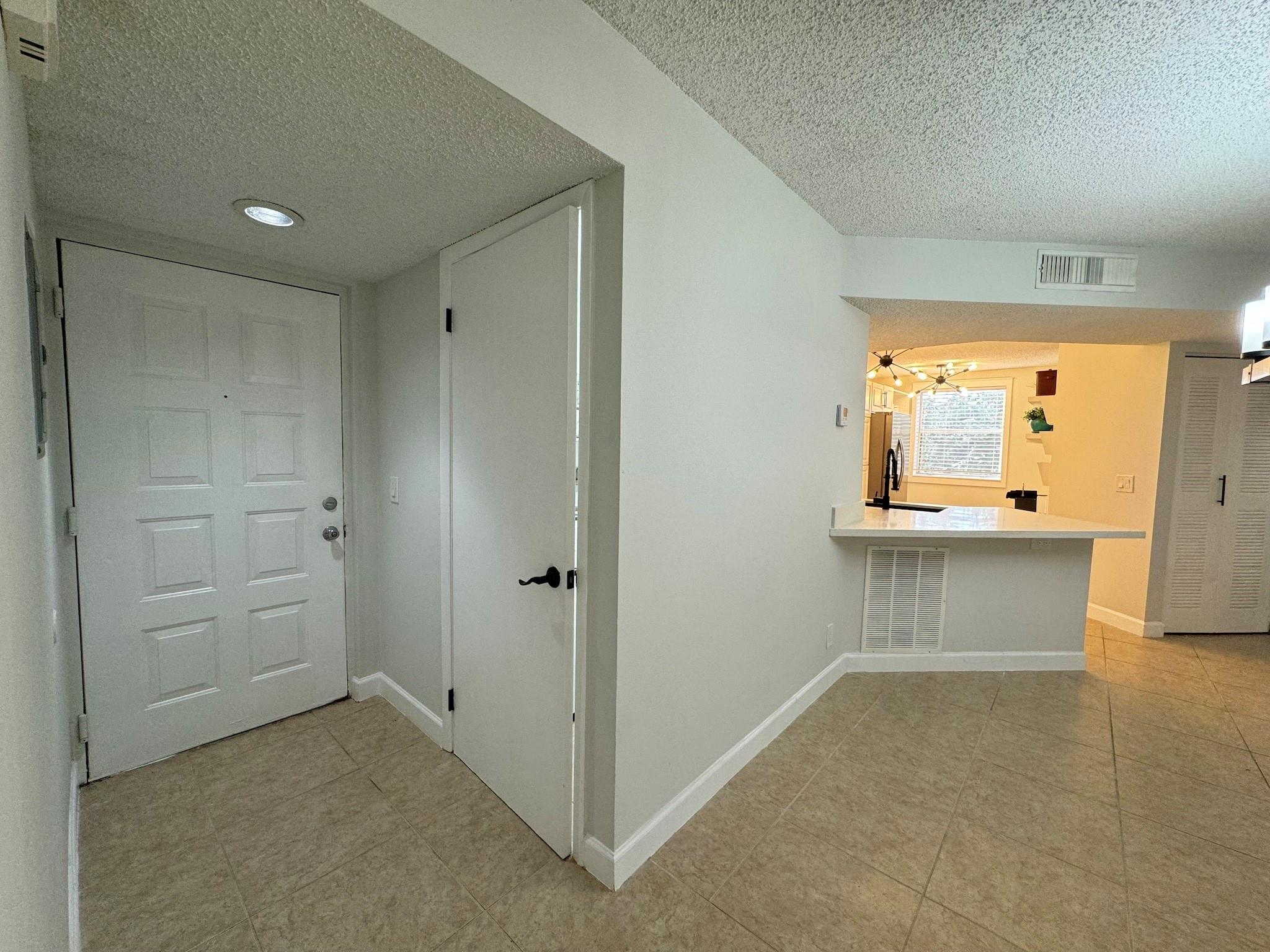 8901 Wiles Rd 208