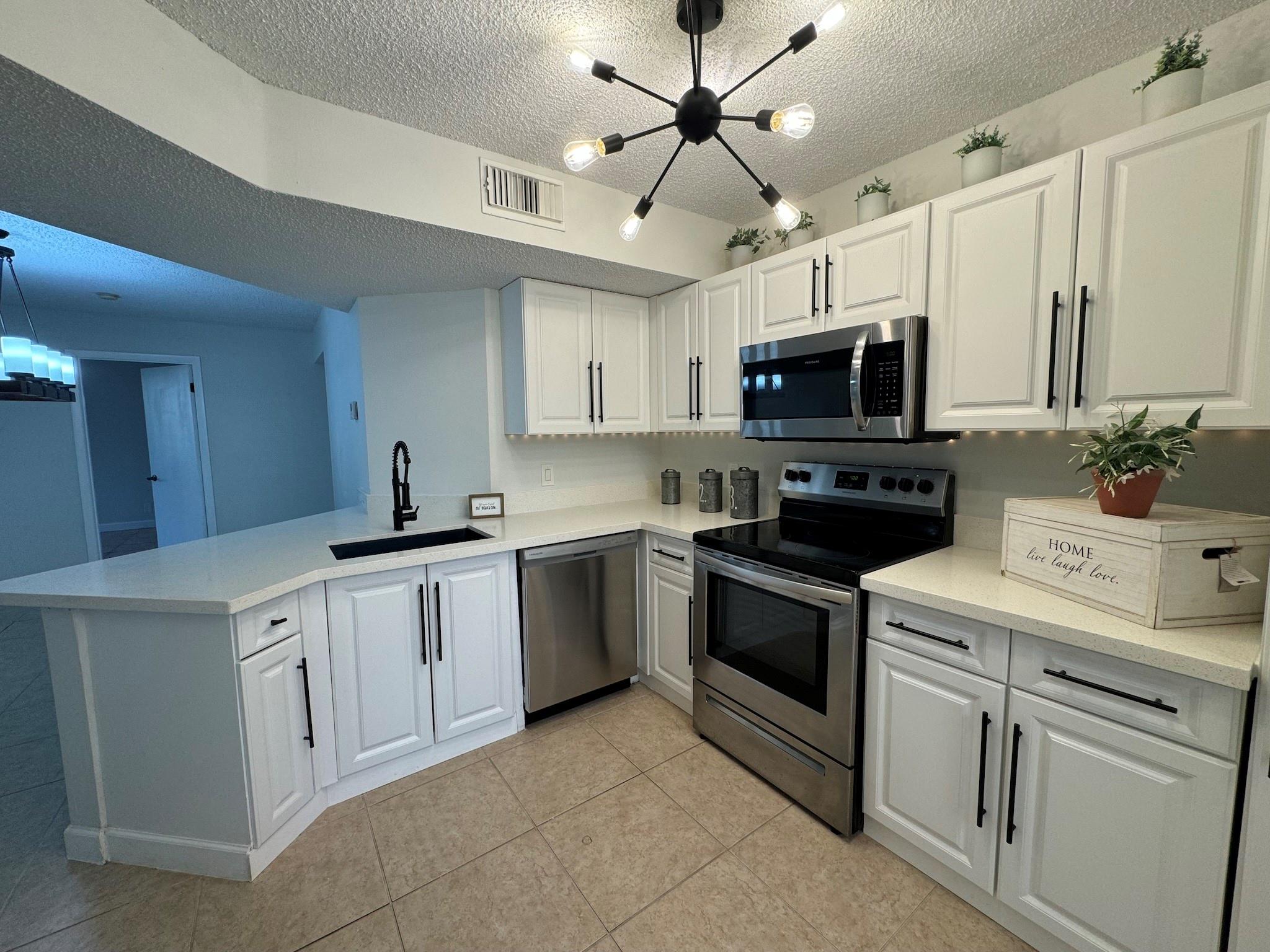 8901 Wiles Rd 208