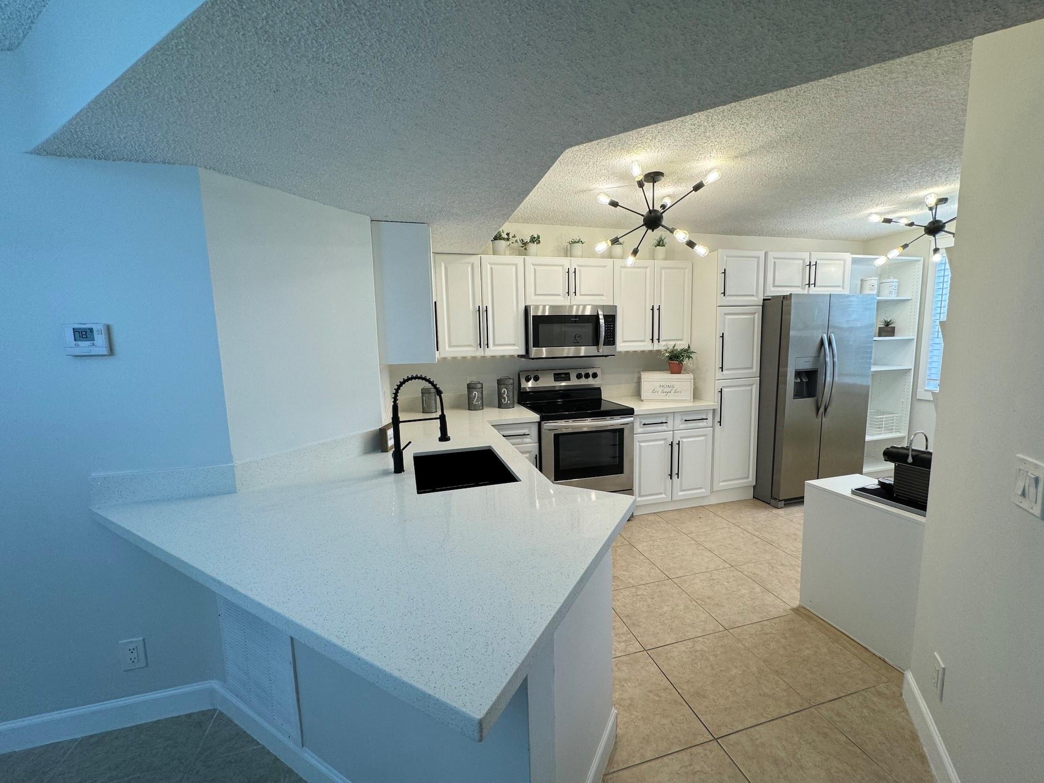 8901 Wiles Rd 208