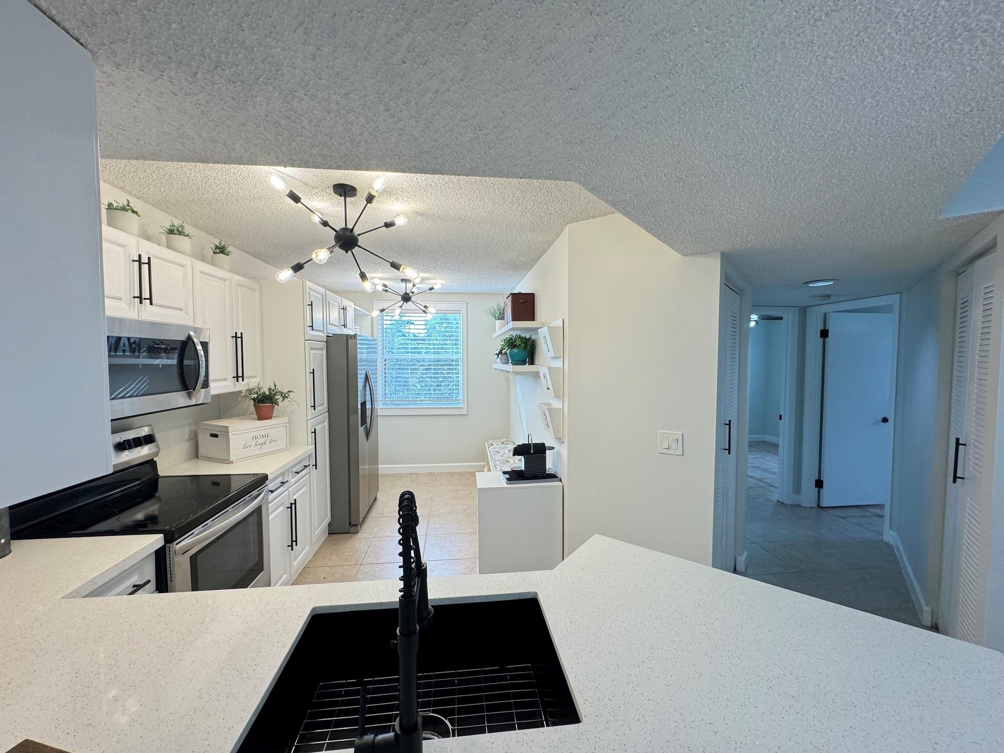 8901 Wiles Rd 208