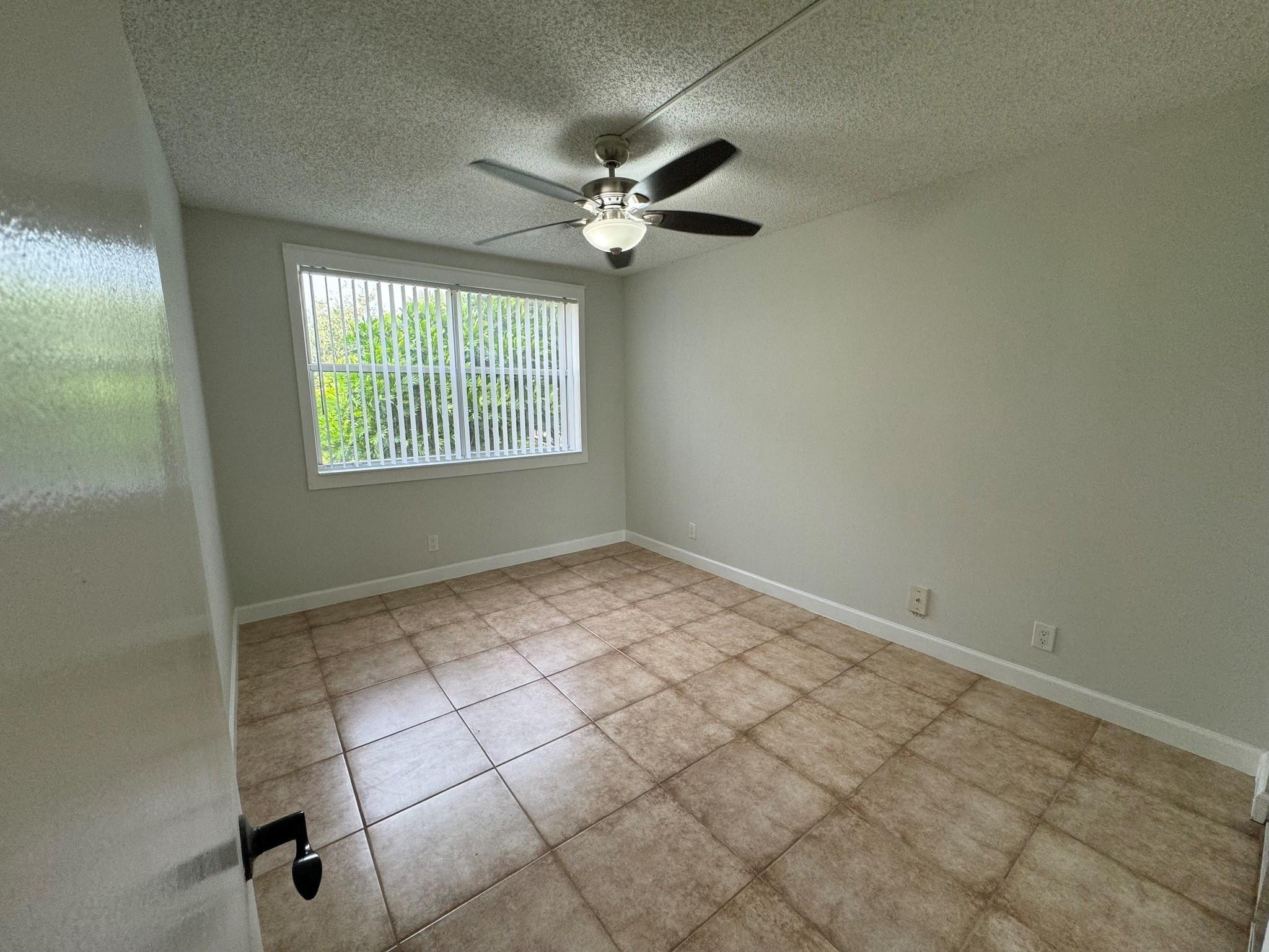 8901 Wiles Rd 208
