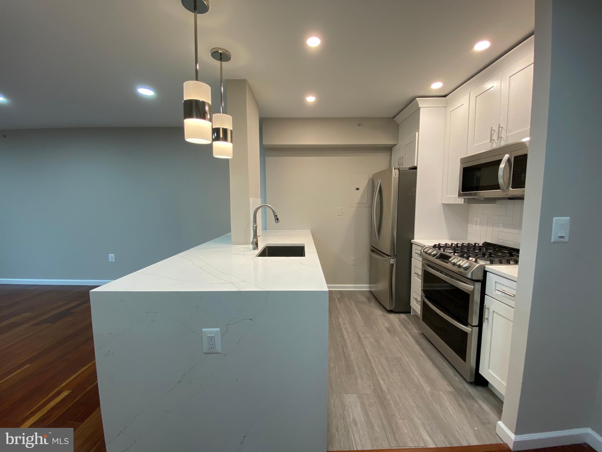 7111 WOODMONT AVE #413