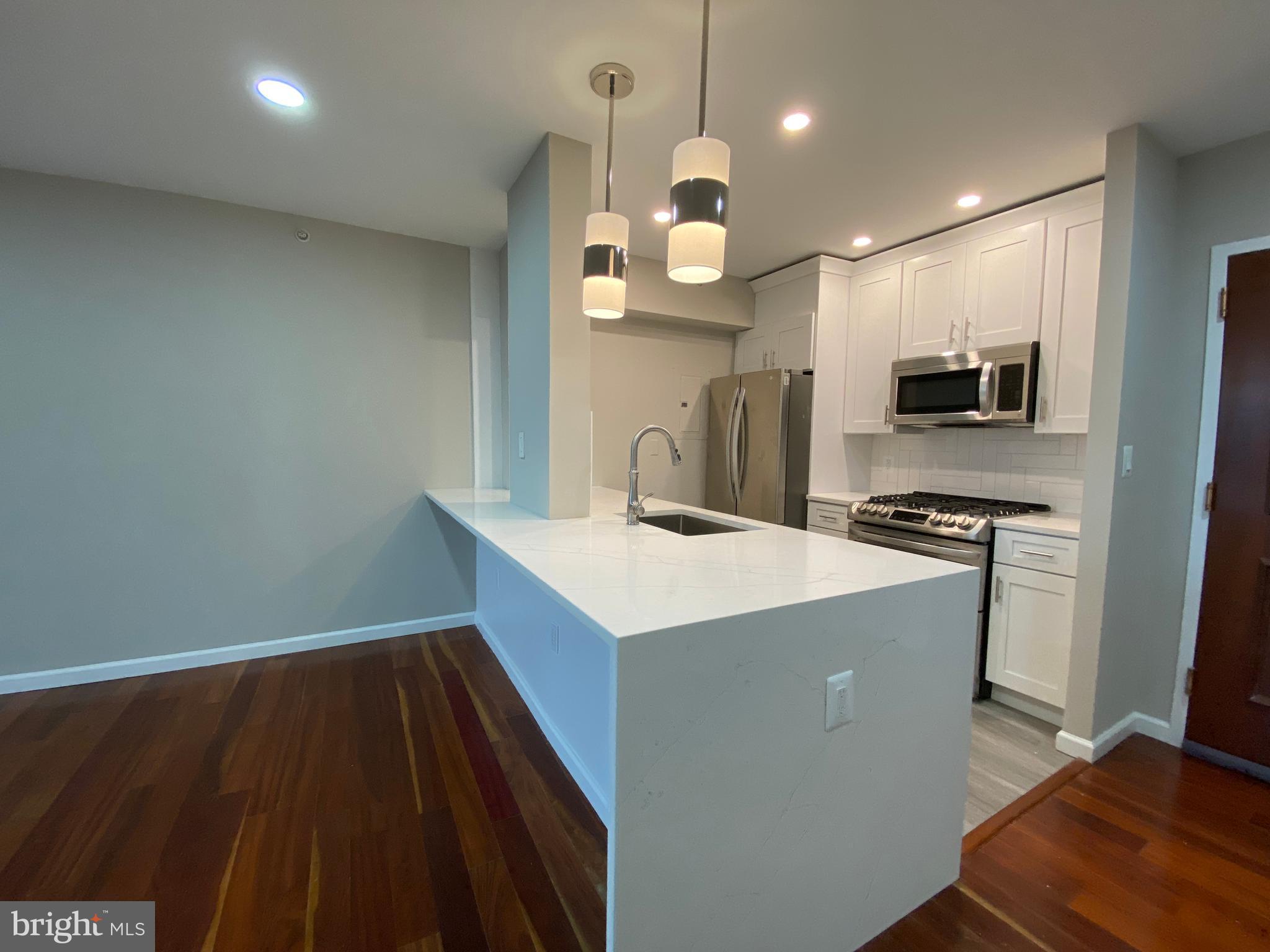 7111 WOODMONT AVE #413