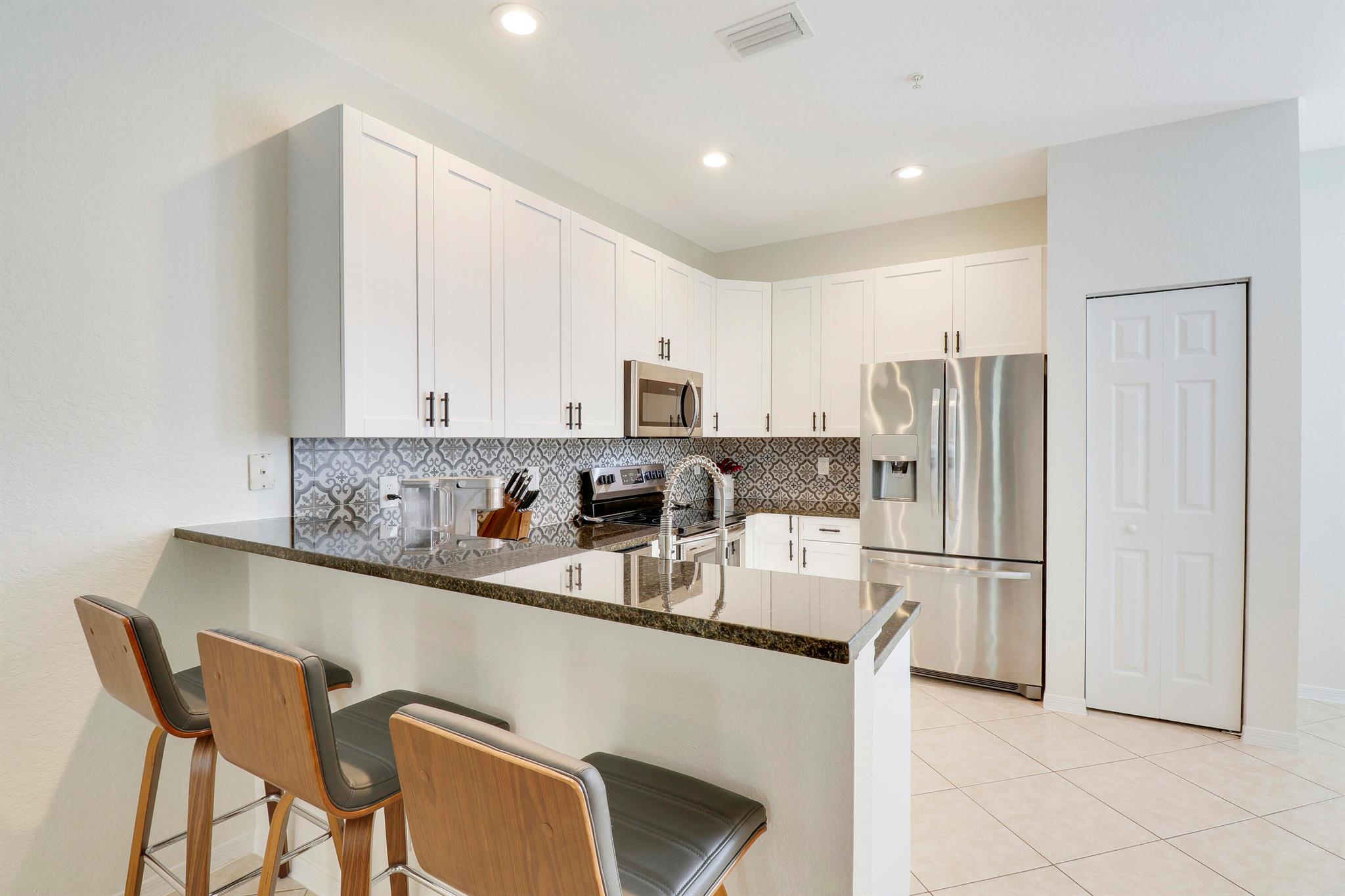 123 E Thatch Palm Circle