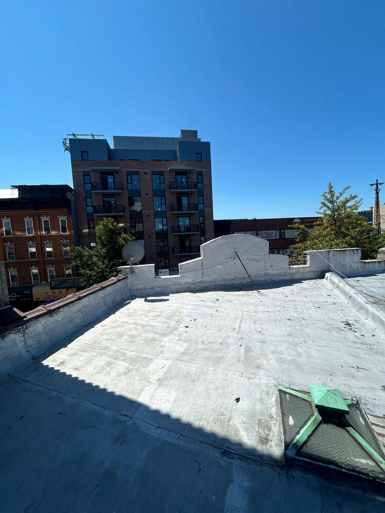 83-13 BROADWAY BLDG