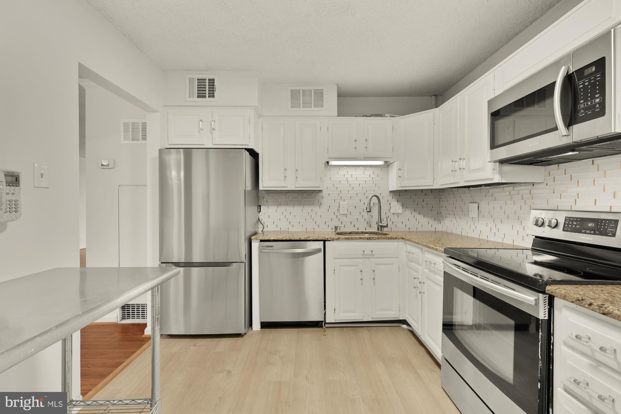 1800 OLD MEADOW ROAD 303