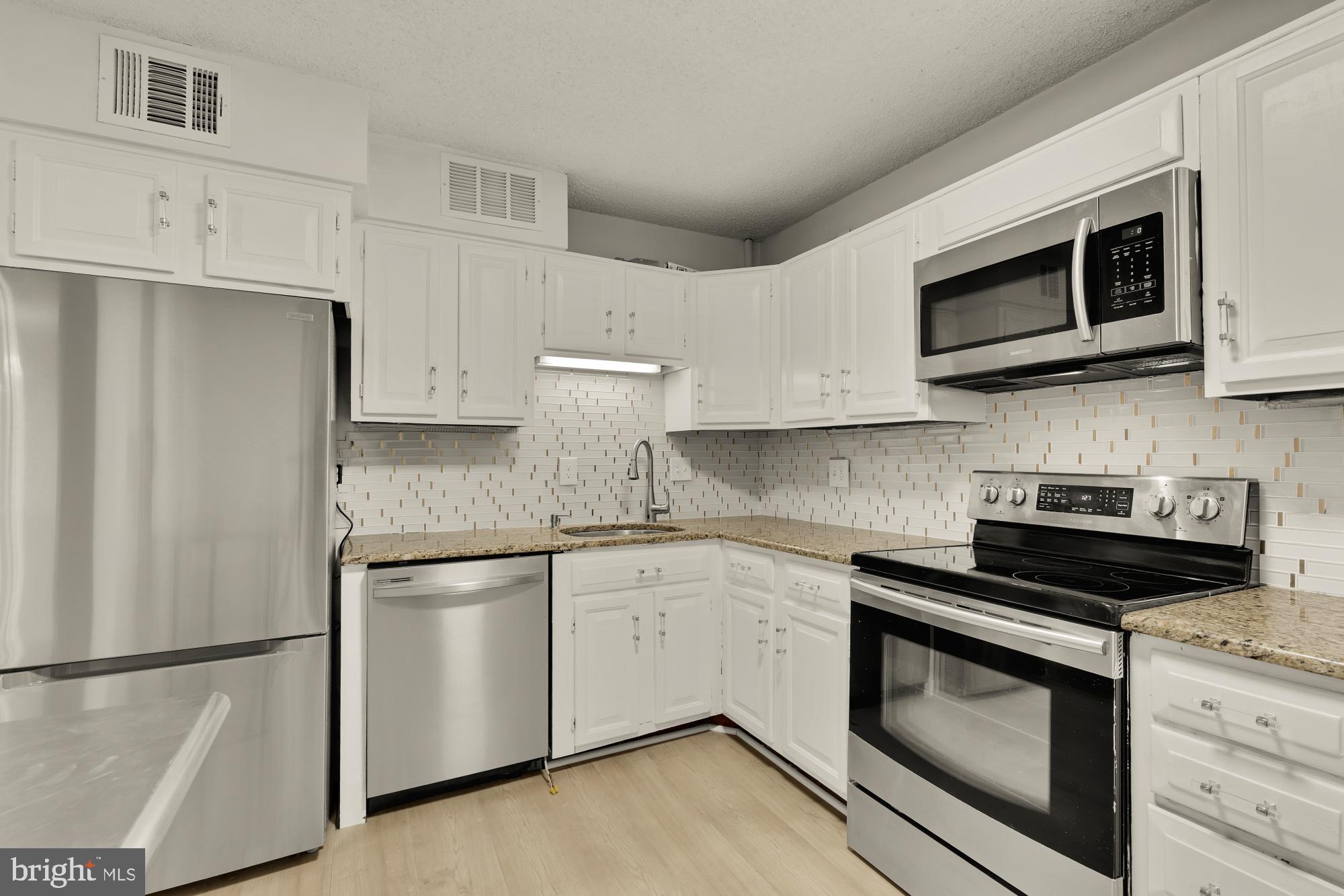 1800 OLD MEADOW ROAD 303