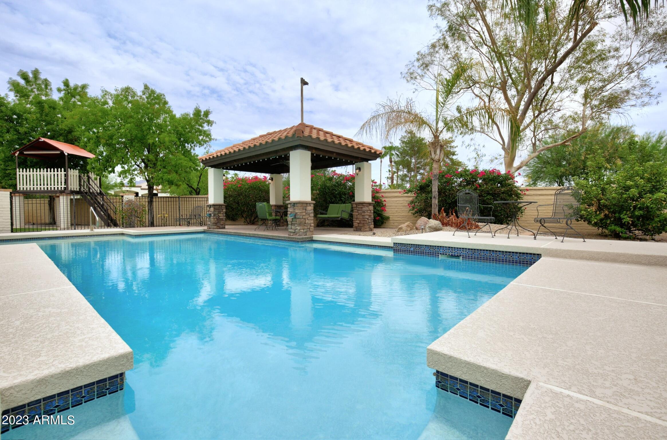 9891 E WINDROSE Drive