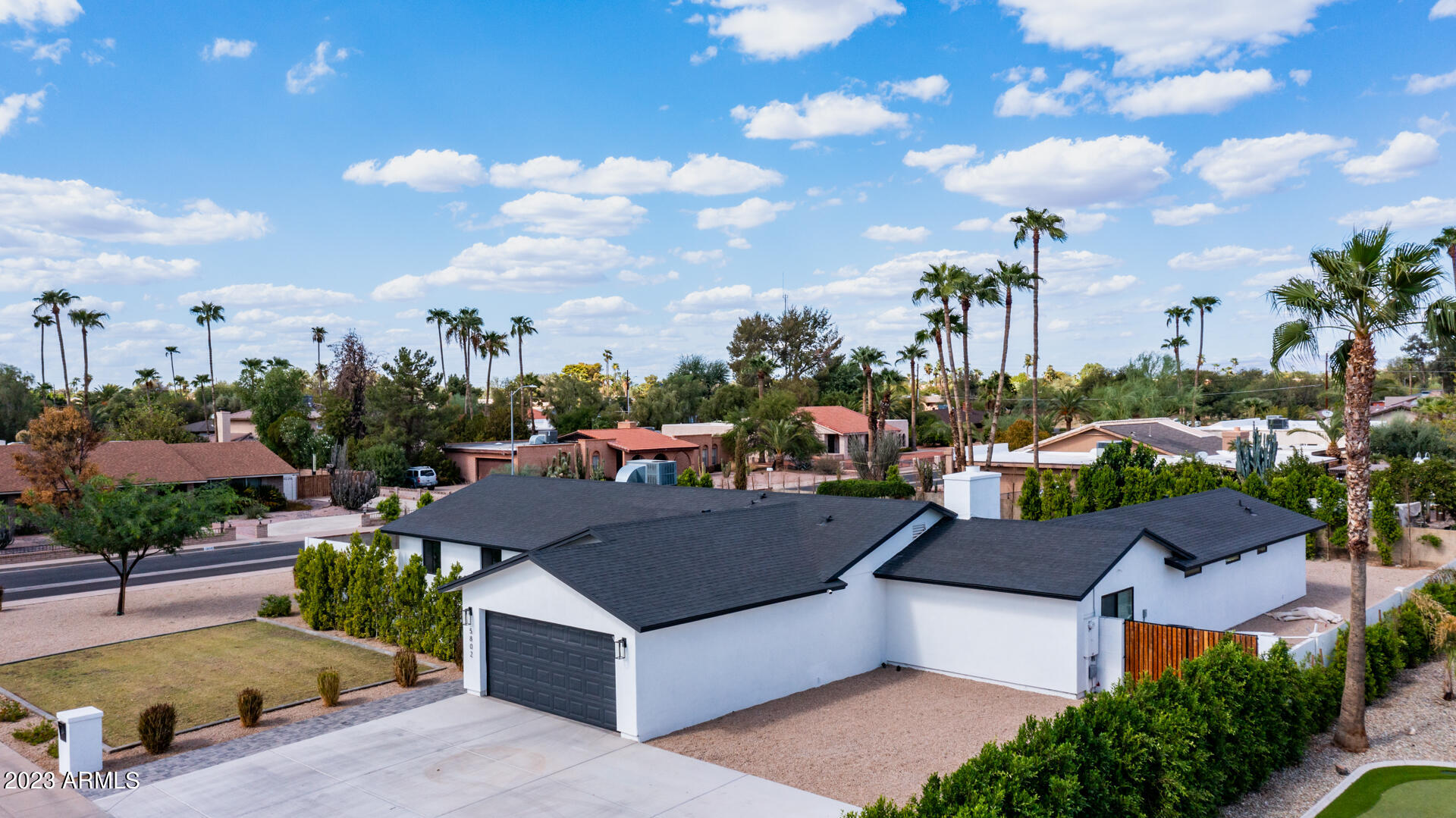5802 E VOLTAIRE Avenue