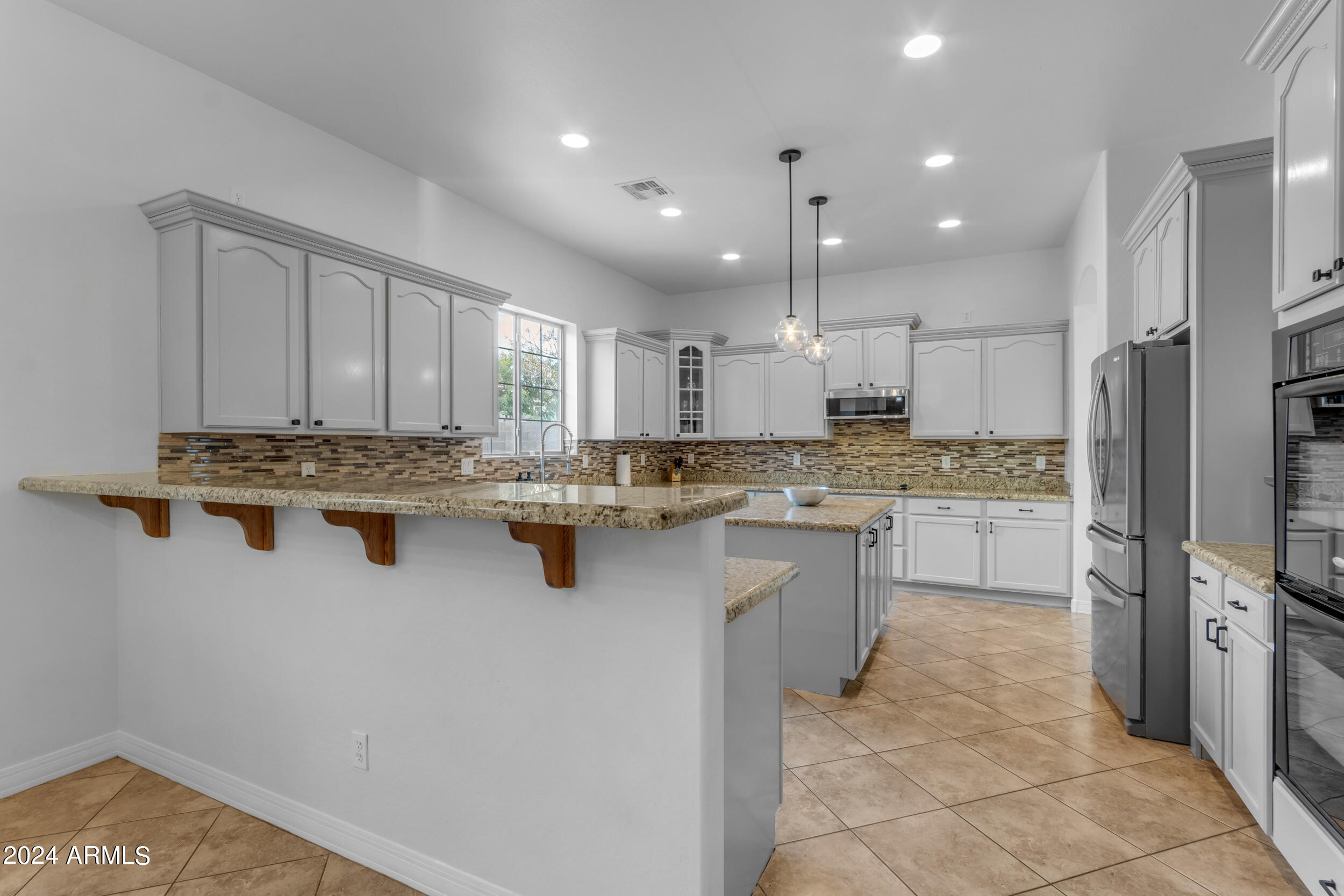 6065 S JOSLYN Lane