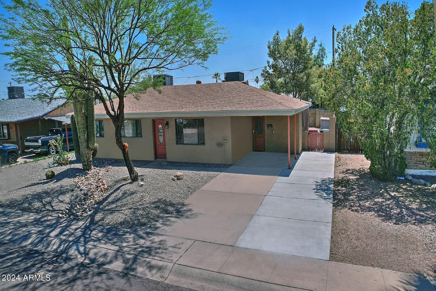 7037 E WILLETTA Street