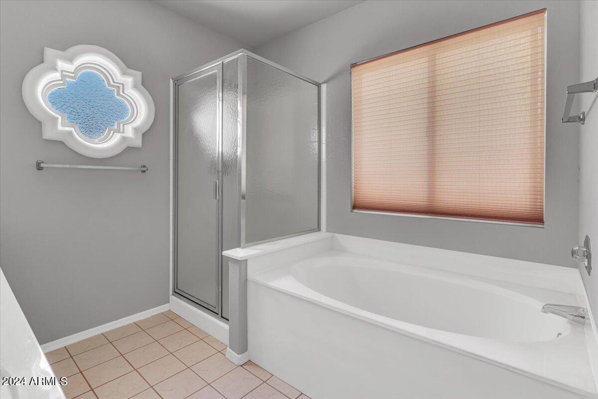 10932 W PUGET Avenue