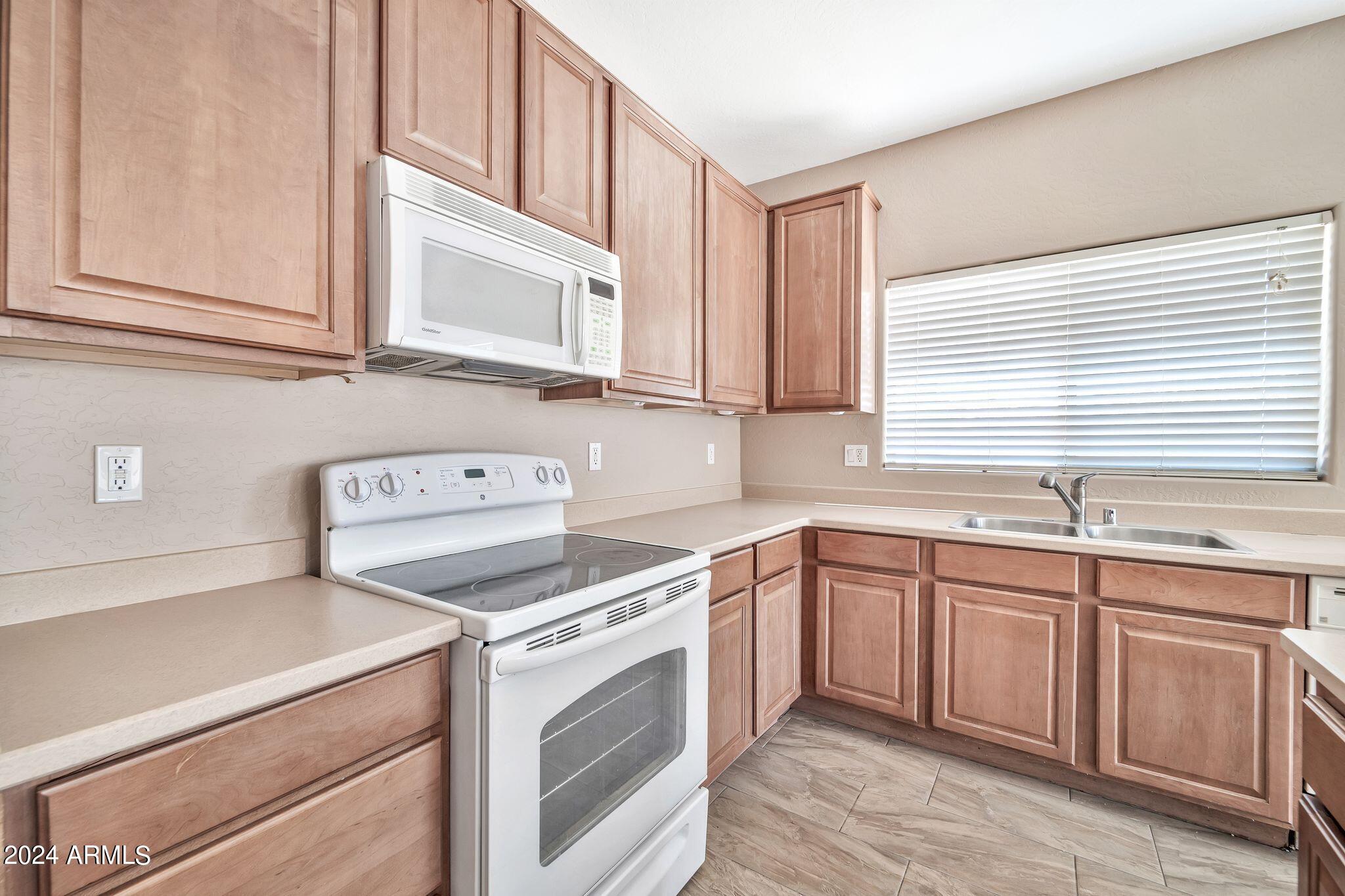 15921 W GELDING Drive