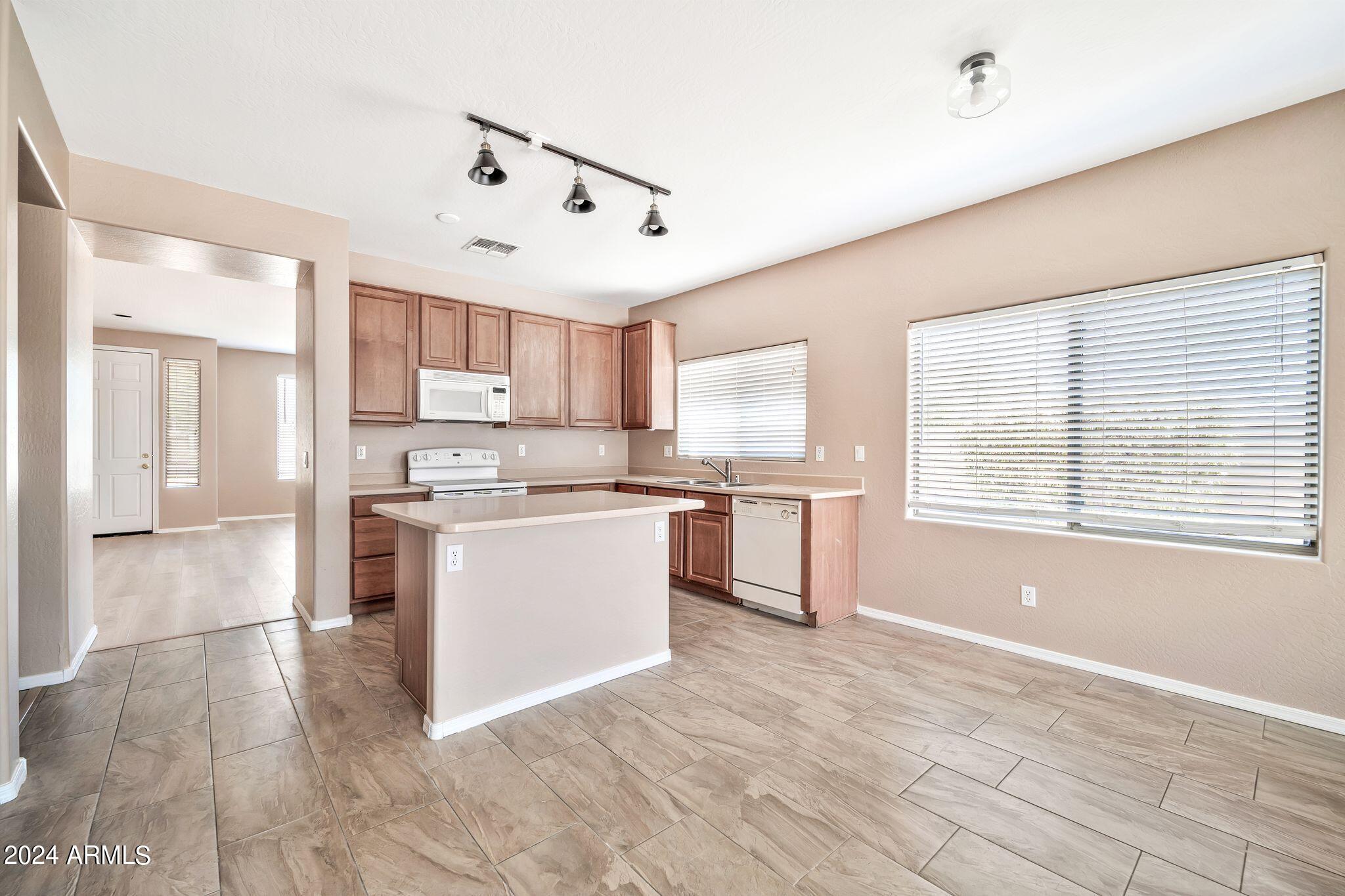 15921 W GELDING Drive