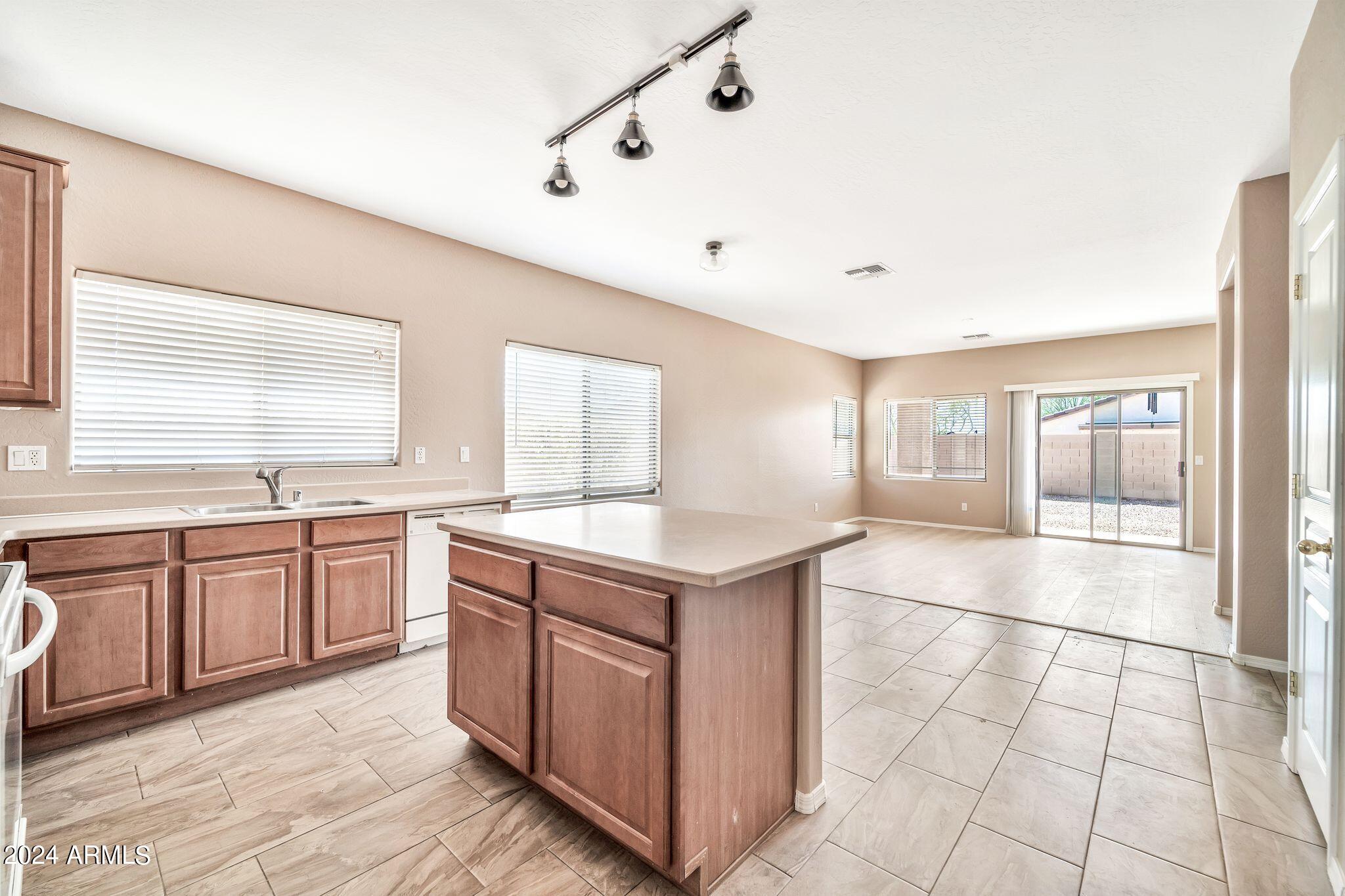 15921 W GELDING Drive