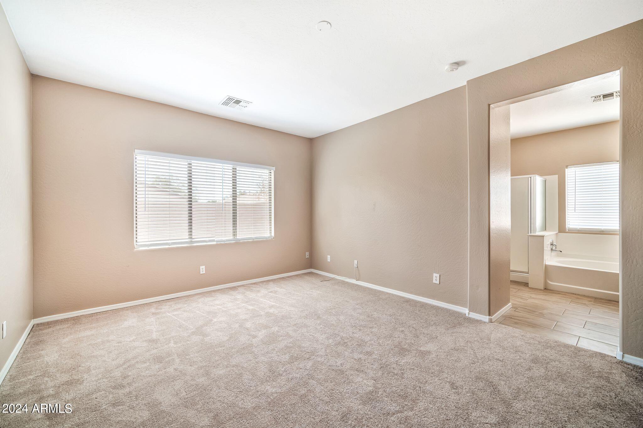 15921 W GELDING Drive