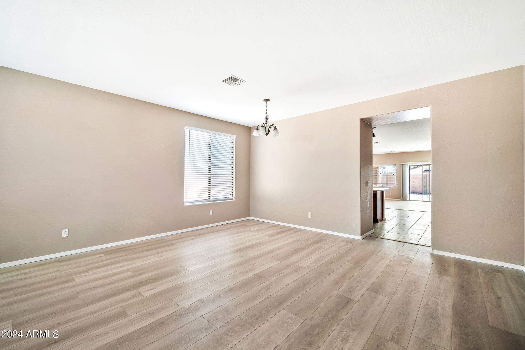 15921 W GELDING Drive