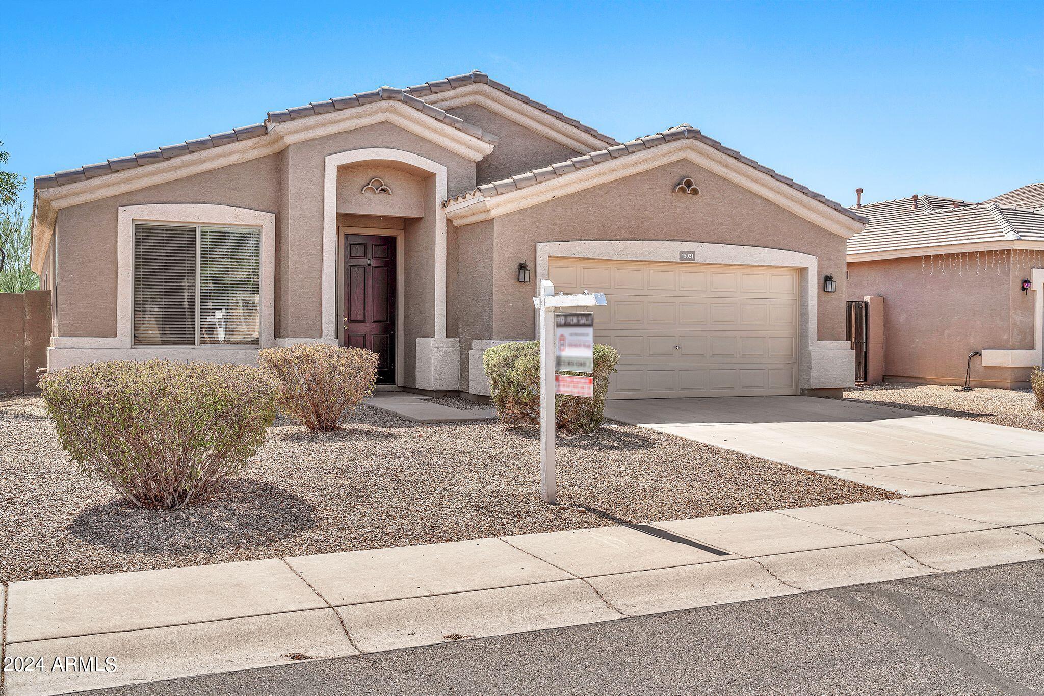 15921 W GELDING Drive