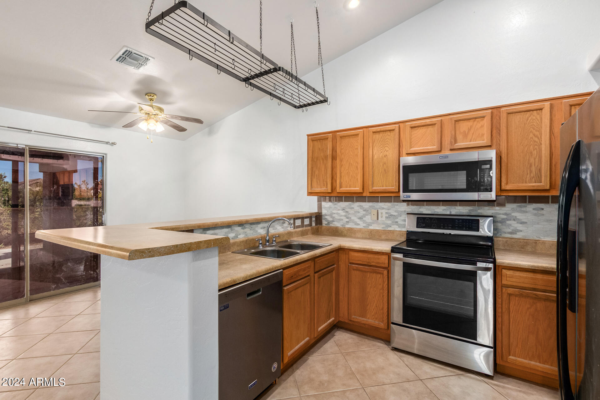 11802 W OBREGON Drive