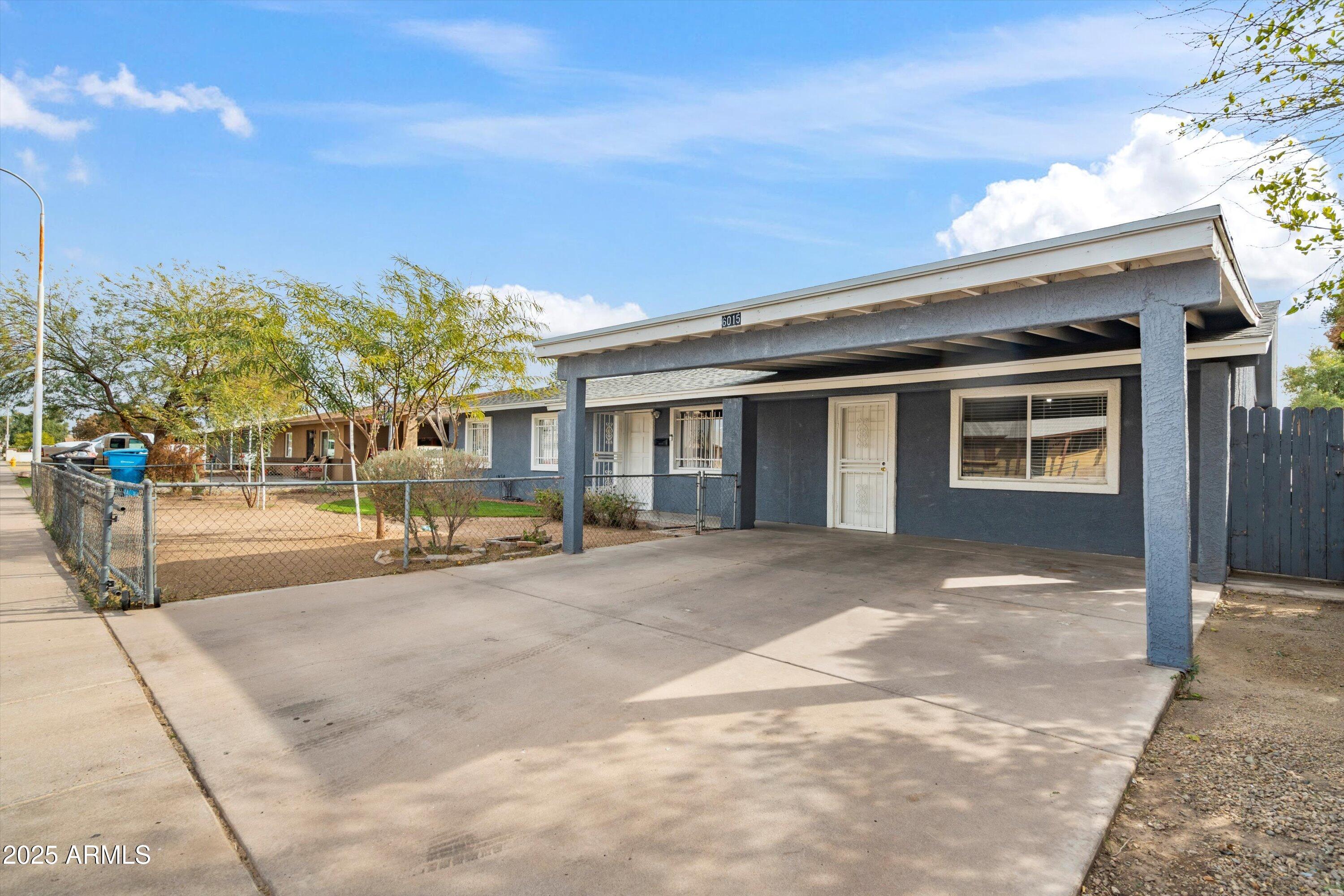 6015 W WHITTON Avenue