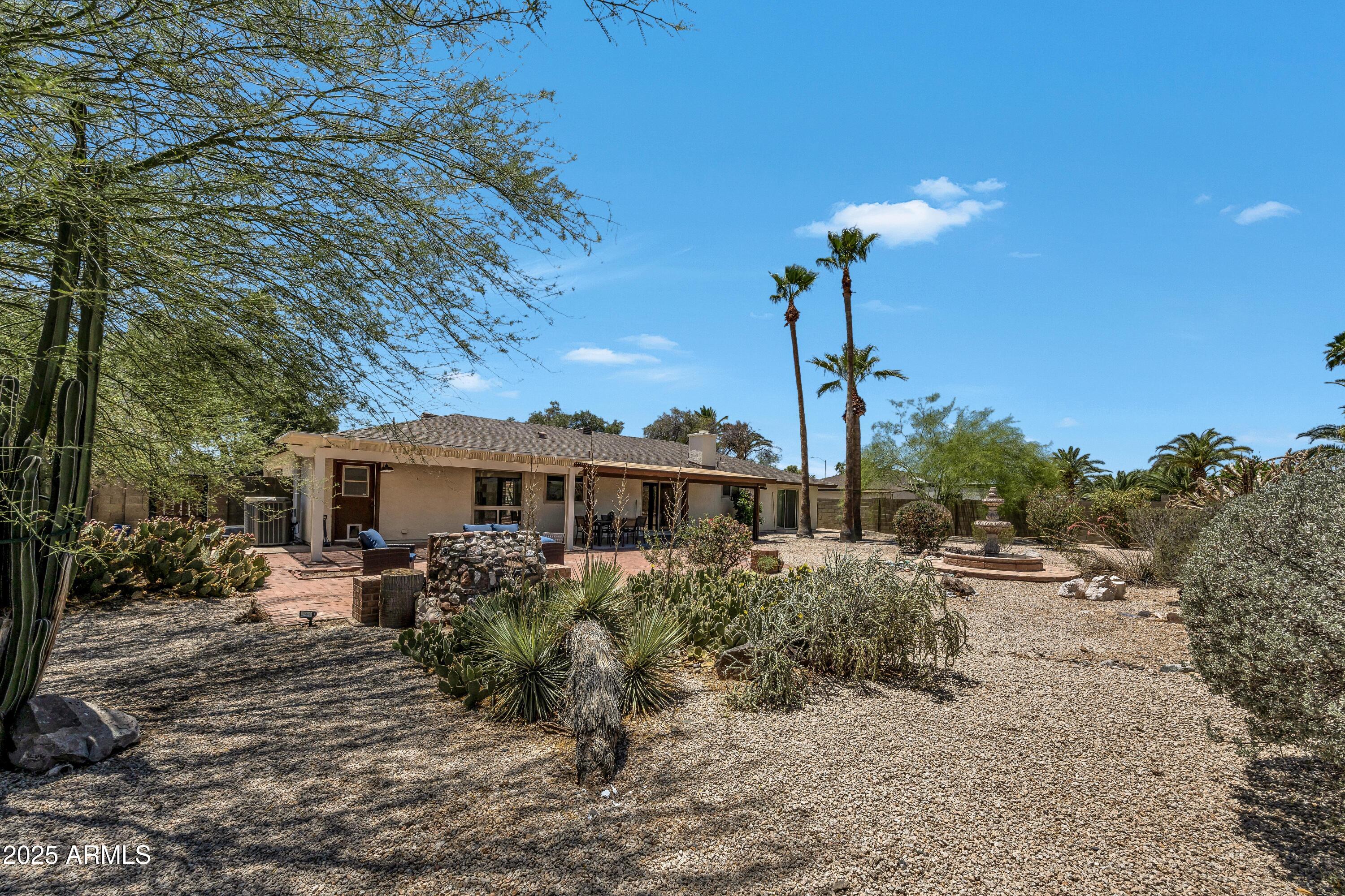 5728 E SHARON Drive