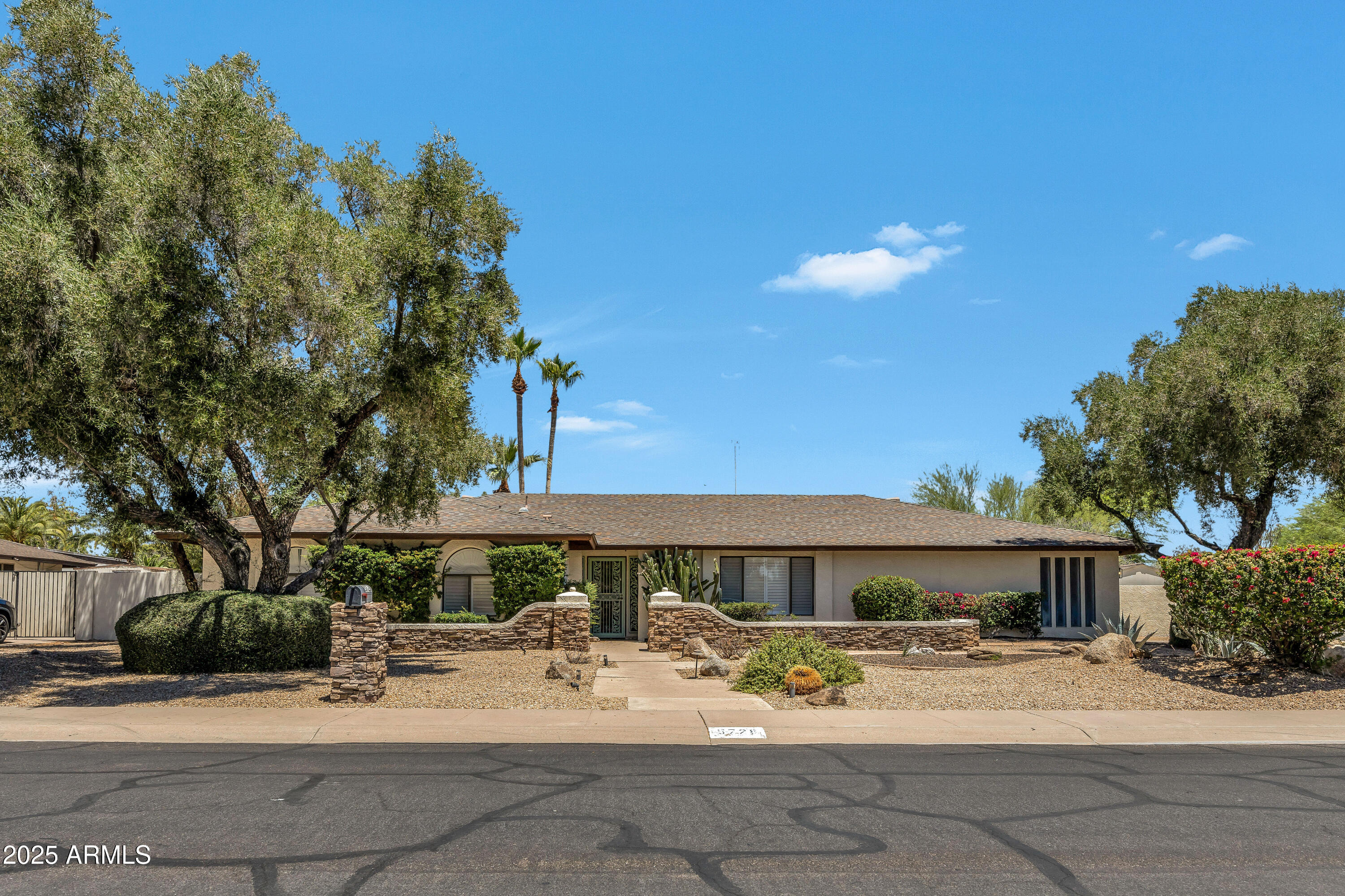 5728 E SHARON Drive